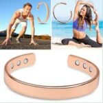 Person with copper bracelet Australia Rose gold color, front view, showing cuff design.
