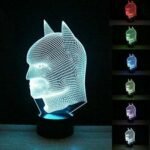 Person with Batman night light Australia Clear acrylic color, front view, showing 3D Batman.