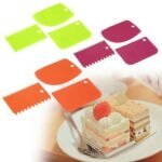 Person with fondant scraper Australia Clear color, front view, showing three scraper designs.