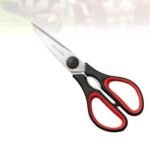 Person with kitchen scissors Australia Silver/Black/Red color, front view, showing steel blades.