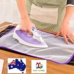 Person with ironing pad Australia Random color mesh, front view, showing fabric cover.