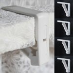 Person with tablecloth clips Australia White color, front view, showing clamp design.