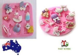 Person with baby shower mold Australia Pink color silicone, front view, showing 3D design.