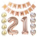 Person with 21st birthday decorations Australia Rose gold color, front view, showing “21” balloon.