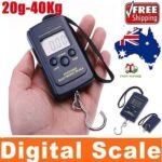 Person with digital scale Australia Black color, front view, showing hanging hook.