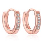 Person with rose gold hoop earrings Australia Gold color, front view, showing CZ zircon.