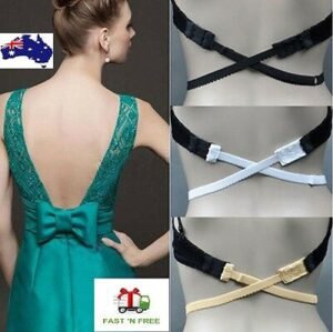 Woman in backless bra extender Black color, front view, showing adjustable hooks.