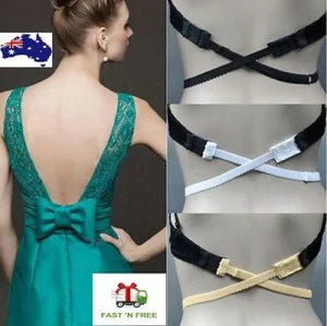 Woman in backless bra extender Black color, front view, showing adjustable hooks.