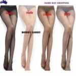 Woman in semi sheer pantyhose Black color, front view, showing thin design.