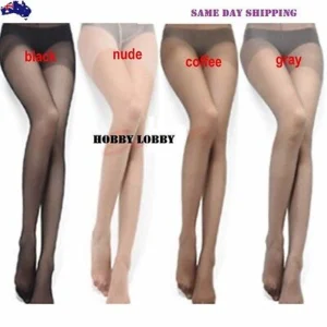 Woman in semi sheer pantyhose Black color, front view, showing thin design.