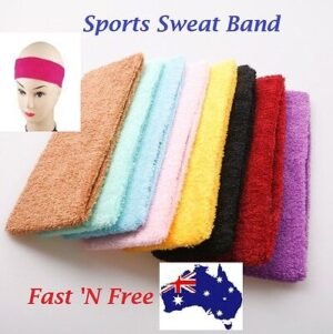 Person in cotton gym headband, front view, showing sweatband design.