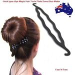 Woman using magic hair bun maker Black color, front view, showing twist design.