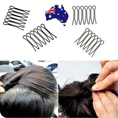 1-421.jpg Woman using fashion bun styling clip Black color, front view, showing steel design.