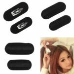 Woman using princess updo hair clip Black color, front view, showing sponge design.