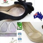 Person with silicone foot care insoles Australia Blue color, front view, showing gel pad design.