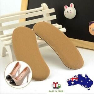Person with sticky heel liners Australia Shown color, front view, showing fabric pad.