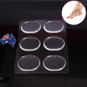 Woman with silicone heel grips Australia Clear color, front view, showing gel pad design.
