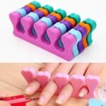 Person with foam toe separators Australia Random color, front view, showing soft foam design.