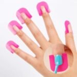 Person with nail polish protector Australia Pink color, front view, showing 26-piece design.