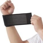 Person with wrist support wrap Australia Black color, front view, showing elastic design.