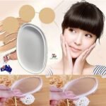 Person with silicone makeup sponge Australia Shown color, front view, showing gel design.