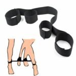 Person with nylon bondage kit Australia Black color, front view, showing cuff design.