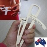 Person with body fat caliper Australia Neutral color, front view, showing measurement scale.