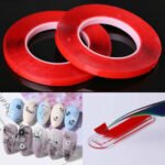 Person with waterproof nail adhesive tape Australia Clear color, front view, showing double-sided design.