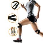 Person with knee support patella belt Australia Shown color, front view, showing silicone bar design.