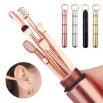 Person with ear wax removal spoon Australia Silver color, front view, showing spiral design.