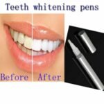 Person with teeth whitening pen Australia Clear color, front view, showing brush tip.