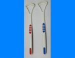 Person with tongue scraper Australia Red/Blue color, front view, showing scraper edge.