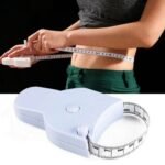 Person with body measuring tape Australia Clear color, front view, showing retractable tape.