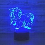 Person with unicorn night light Australia Clear color, front view, showing 3D acrylic.