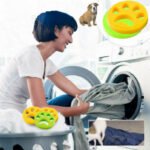 Person with pet hair remover Australia Yellow/Green color, front view, showing round silicone.