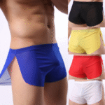 Man in sexy transparent briefs men Multicolored design, front view, showing ice silk design.