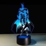 Person with Batman night light Australia Clear acrylic color, front view, showing 3D Batman.