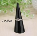 Acrylic ring stand Australia Black color, front view, showing cone design.
