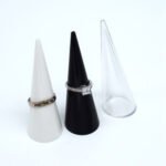 Acrylic ring holder Australia Black/white/transparent color, front view, showing cone design.