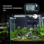 Digital aquarium thermometer Australia Black plastic, front view, showing LCD screen.
