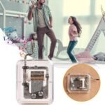 Mini music box Australia Transparent metal design, front view, showing notes.