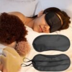 Travel sleep mask Australia Black design, front view, showing 4-layer structure.