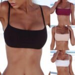 Woman in unpadded bikini top Wine Red color, front view, showing natural fit.