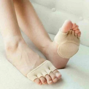 Woman in invisible anti slip socks, front view, showing silicone lined design.