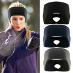 Woman in fleece ponytail headband Black color, front view, showing ponytail slot.
