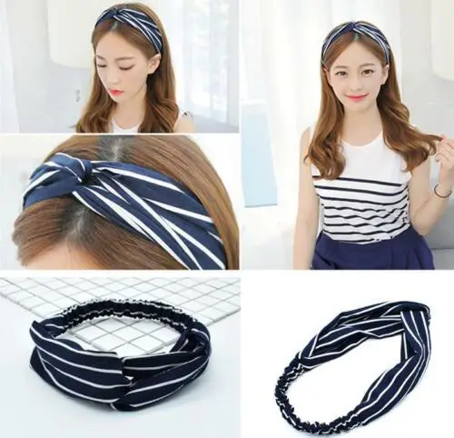 12-775.jpg Woman using elastic yoga headband women Black color, front view, showing cross design.