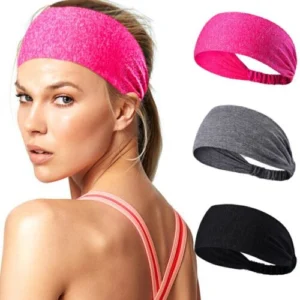 Person in wide yoga headband women Black color, front view, showing elastic design.