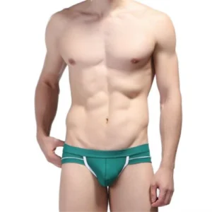 Man in mesh penis pouch briefs Blue color, front view, showing pouch design.