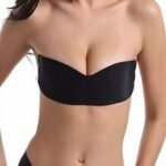 Woman in invisible lift bra Black color, front view, showing natural lift.