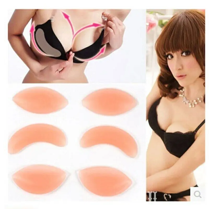 57-1521-1.jpg Woman in silicone bra inserts Black color, front view, showing natural lift.